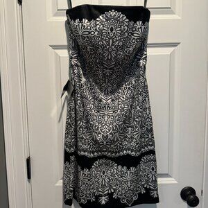 Strapless black and white dress, with belt